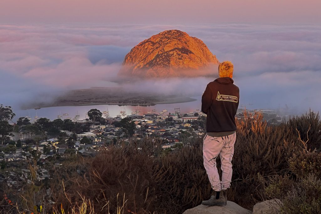 Hiker enjoying the view from Morro Bay Black Hill trail