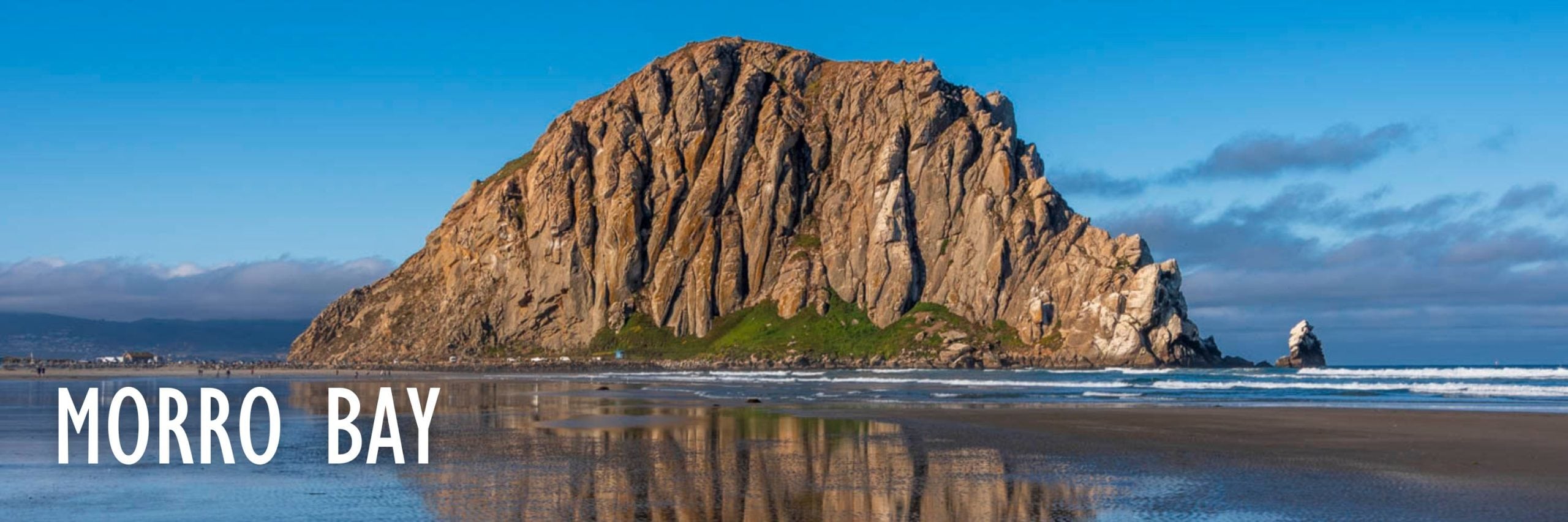 image of morro rock with the beach