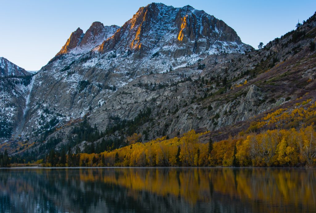 Sun hitting the Carson Peak by Silver Lake in Autumn, Eastern Sierra