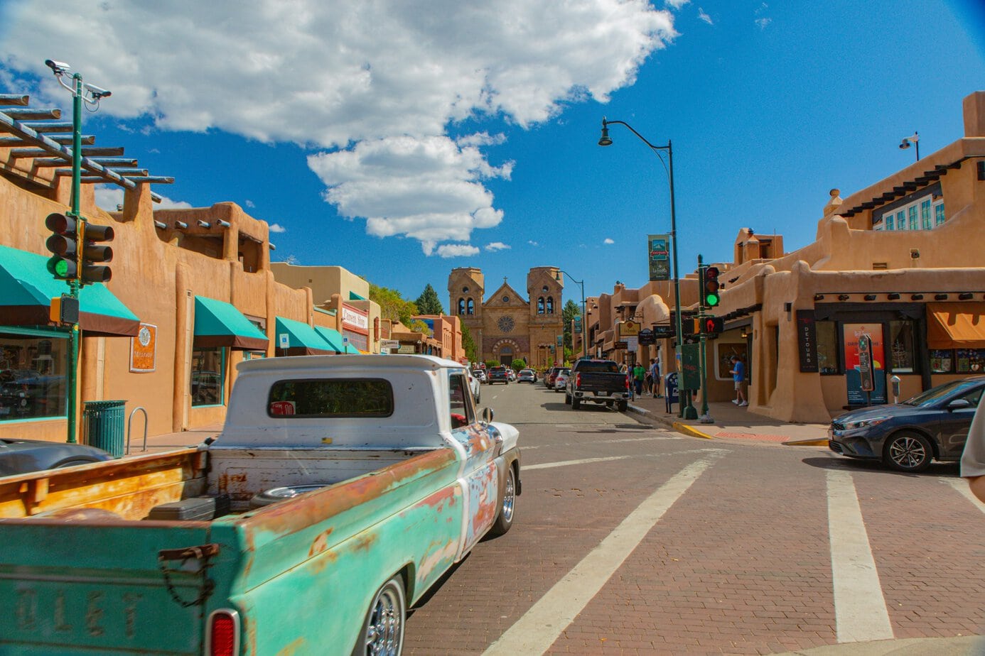 Blue truck driving along the Santa Fe City in New Mexico