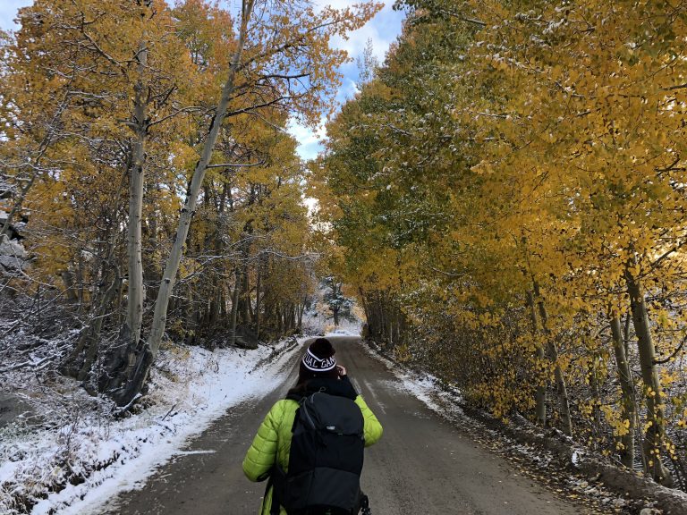 Showing Basak Prince shooting in Eastern Sierra wearing the Think Tank Rotation 22L camera backpack