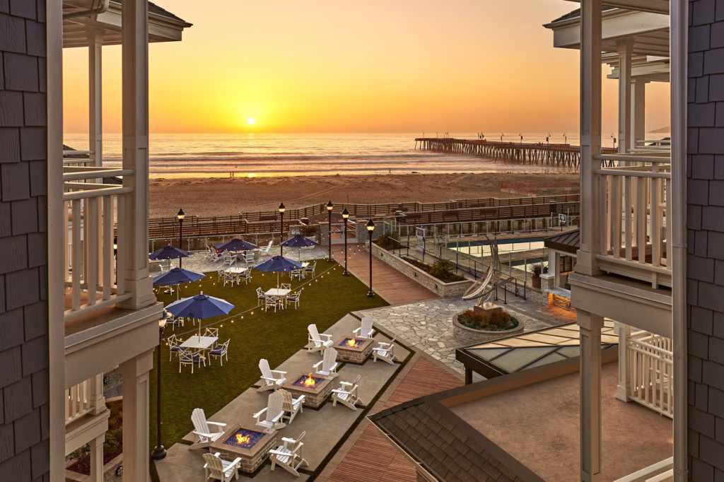 Vespera Resort in Pismo Beach with oceanfront courtyard, fire pits, and sunset view of the Pismo Beach Pier