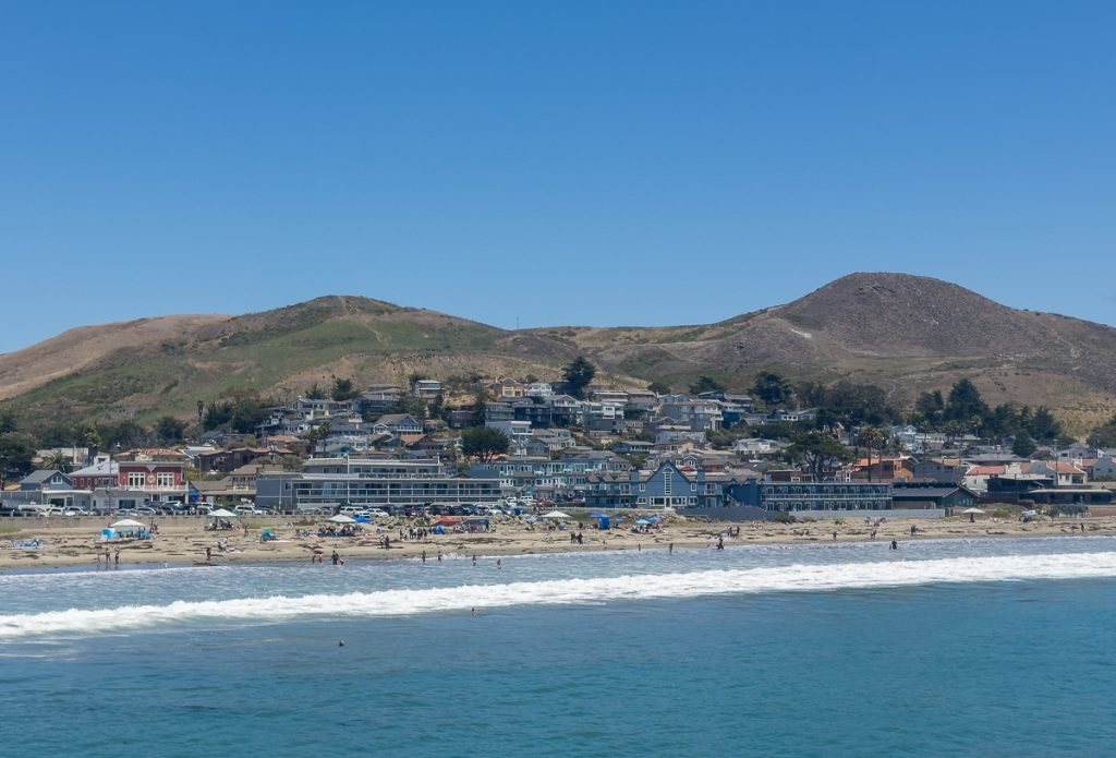 View of Cayucos State Beach and the town shoreline from Cayucos Pier.