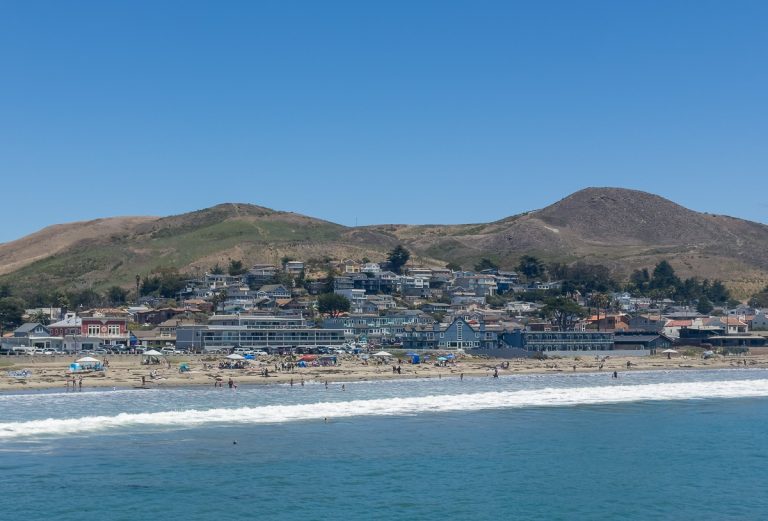 View of Cayucos State Beach and the town shoreline from Cayucos Pier.