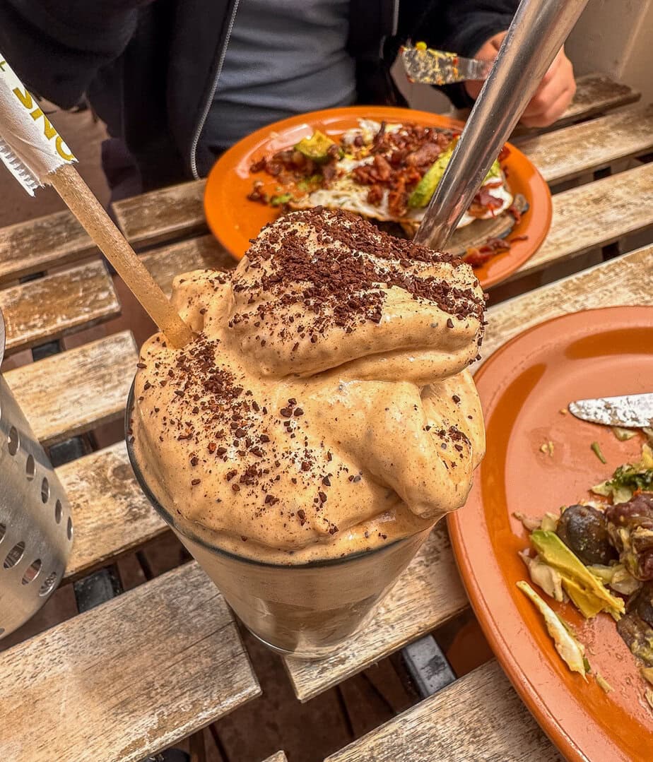 Chocolate smoothie and colorful brunch plates at Hidden Kitchen in Cayucos, California.